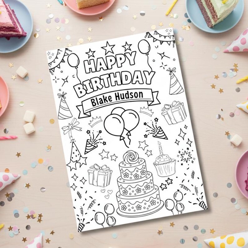 Puede incluir: Una p&aacute;gina para colorear en blanco y negro con el texto "HAPPY BIRTHAY Blake Hudson", globos, regalos y una tarta. La p&aacute;gina est&aacute; sobre una superficie de madera clara con pastel y art&iacute;culos de fiesta.