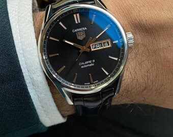 Reloj automático TAG Heuer Carrera Calibre 5 vintage con esfera negra, fecha y día, fabricado en Suiza, reloj de vestir de lujo para hombre con correa de cuero, pieza clásica.