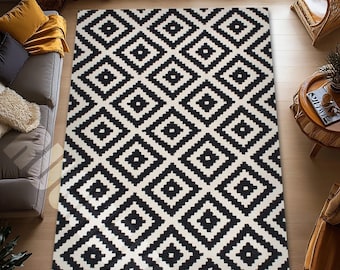 Czarno-biały geometryczny dywan w nowoczesnym, diamentowym wzorze, minimalistyczny wystrój domu w stylu boho