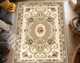 May include: A rectangular beige area rug with an ornate floral design. The rug features a central oval medallion with a bouquet of red roses, surrounded by scrolling vines and flowers in shades of red, beige, and green. The border has a repeating pattern.