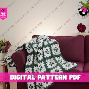 May include: A green and white crochet blanket draped over a burgundy sofa. The blanket features a repeating floral pattern. The words "DIGITAL PATTERN PDF" are displayed in a pink banner across the bottom of the image.