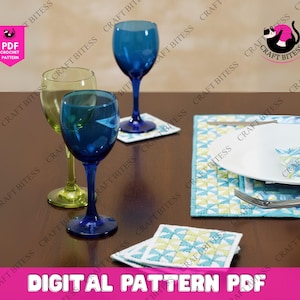 May include: A table setting featuring three colored wine glasses: blue, green, and blue. The glasses sit on a dark wooden table with a placemat, a plate, and a napkin. The image includes the text "DIGITAL PATTERN PDF".