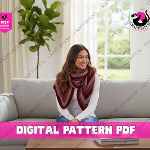 May include: A burgundy and cream-colored crochet shawl is draped over the shoulders. The shawl has a triangular shape with a striped pattern. The image also includes the text "DIGITAL PATTERN PDF" and logos for "Craft Bitess" and "PDF Crochet Pattern".