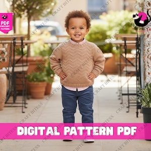 May include: A young child wearing a tan sweater with a chevron pattern, a white collared shirt, and blue jeans. The child is standing outdoors with a smiling expression. The image includes text that reads "DIGITAL PATTERN PDF".