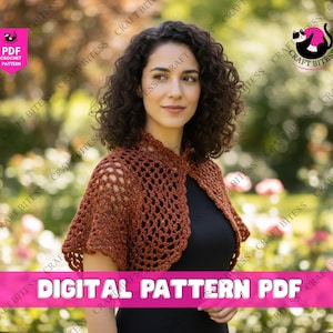 May include: A woman wearing a brown crochet shawl. The shawl has an open, lacy design. The image includes the text "DIGITAL PATTERN PDF". The background is a blurred outdoor scene with green foliage and pink flowers.