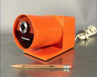 Midcentury Modern Orange Electric Pencil Sharpener by Panasonic, model KP-22A Pana-Point Pencil Sharpener from Panasonic, 1970s.
