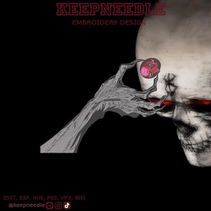 May include: An embroidery design featuring a skull with glowing red eyes and a hand holding a red object. The design is in grayscale with the text "KEEPNEEDLE EMBROIDERY DESIGN" at the top.
