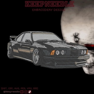 May include: Black embroidered car design with the text "KEEPNEEDLE EMBROIDERY DESIGN" in red. The image also includes social media handles and file type information. The car is a coupe with a spoiler and detailed stitching.
