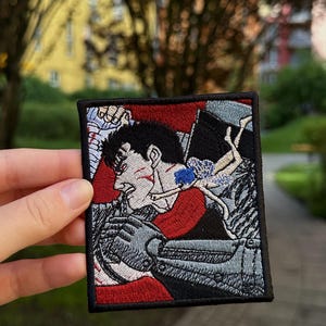 Dark Fantasy Manga Patch – Armoured Warrior and Winged Fairy, Red Black Crosshatch Panel Art