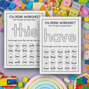 May include: Two white coloring worksheets with the words "this" and "have" printed in large, bold letters. Each worksheet includes a list of sight words to color. The worksheets are surrounded by colorful wooden toys.