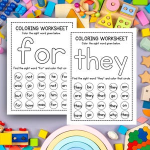 May include: Two white coloring worksheets with the words "for" and "they" printed in large, bold letters. Each worksheet has a section to find and color the sight word. The worksheets are surrounded by colorful wooden toys.