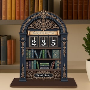 May include: A dark blue and gold wooden bookshelf-shaped counter with the text "BOOKS READ THIS YEAR" and the numbers "235". The bookshelf has miniature books and the text "Taylor's Library".