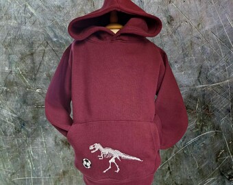 Footy Rex: Sudadera con capucha de T-Rex que brilla en la oscuridad; esqueleto de dinosaurio bordado, personalización disponible