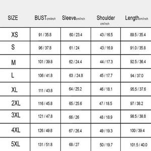 May include: A size chart for clothing, displaying measurements in both centimeters and inches. The chart includes sizes from XS to 5XL, with bust, sleeve, shoulder, and length measurements. The measurements are clearly labeled for each size.