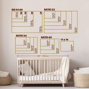 May include: A size guide chart for wall art prints featuring ISO A1-A4, 2:3, 3:4, 4:5, and 11x14 ratios with specific dimensions in inches and centimeters. The chart includes a 55-inch measurement line and is displayed above a wooden crib.