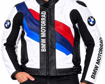 May include: A white, black, blue, and red leather motorcycle jacket featuring the BMW Motorrad logo on the sleeves and chest. The jacket has a central zipper, a stand-up collar, and diagonal color-blocked stripes across the front torso area.