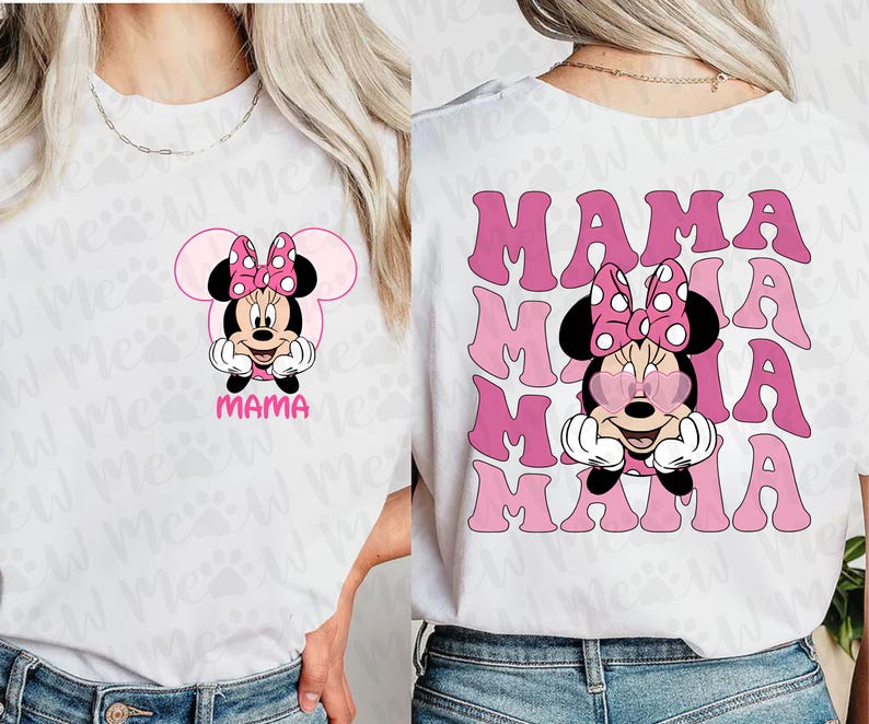 May include: White t-shirt featuring a pink Minnie Mouse graphic with a polka dot bow and the word "MAMA" in pink. The back of the shirt repeats "MAMA" in a retro font, with Minnie wearing heart-shaped sunglasses.