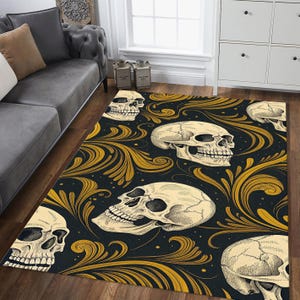 May include: A rectangular area rug featuring a repeating pattern of detailed skulls and ornate golden swirls against a black background. The rug is placed on a hardwood floor, adding a gothic or Halloween theme to the room.
