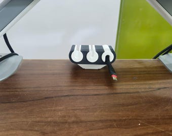 Organizador de mesa para cables USB