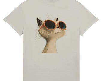 May include: A light gray t-shirt featuring a cartoon cat wearing orange sunglasses. The cat has a cream-colored face, black ears, and long whiskers. The sunglasses have dark lenses. The t-shirt is a simple crew neck style.
