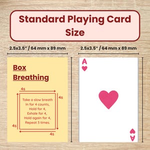 May include: A standard playing card and a yellow card with box breathing instructions. The playing card is white with a pink heart and ace symbols. The yellow card has text and a diagram. Both cards are 64 mm x 89 mm.