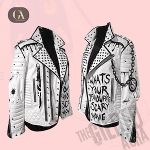 May include: White leather jacket with black detailing, studs, and zips. The jacket has a quilted pattern, black paint splatters, and the text "Whats Your Favourite Scary Movie". A chain and knife graphic are also visible.