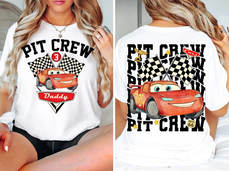 May include: White t-shirt featuring a cartoon image of a red race car with the text "PIT CREW" and "Daddy". The front design includes a number 3 and checkered flags. The back of the shirt also has a race car design and the text "PIT CREW".