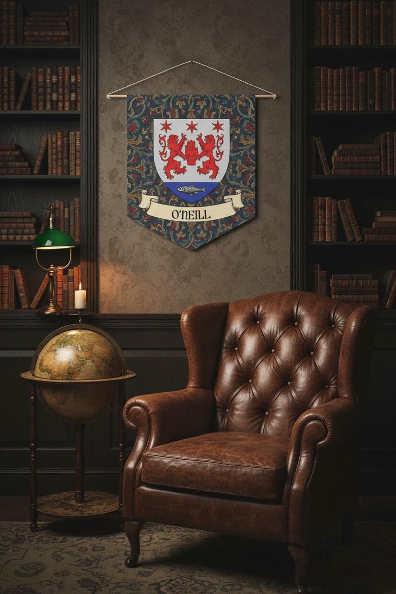 May include: A decorative wall banner with the name "O'NEILL" displayed on a scroll. The banner features a coat of arms with red lions and stars on a white shield, set against a blue and floral patterned background. A brown leather armchair is in the foreground.