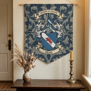 May include: A navy blue banner with a family crest design. The crest features a shield with a red boar, a helmet, and the name "Hess" below. The banner also includes the phrase "Virtute et Valore" and decorative floral patterns.