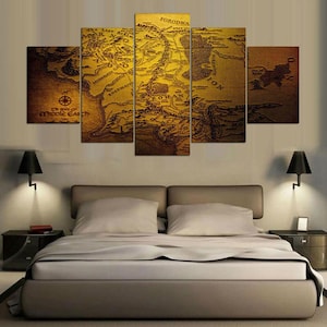 May include: A five-panel canvas wall art set depicting a vintage map of Middle Earth. The map is in shades of brown and gold, with text including "FORODWA" and "The Middle Earth". The artwork is displayed above a bed.