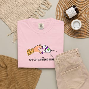 Comfort colors® Toy Story Friends Graphic T-Shirts, You Got a Friend in Me heart shaped hands T-shirt image 1