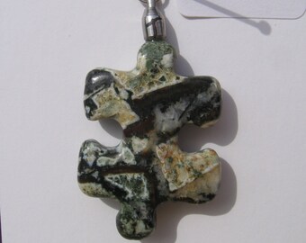 SOLD--RA59 Puzzle Piece Rock Pendant