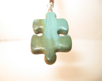 SOLD- RA62 Puzzle Piece Rock Pendant