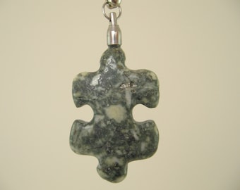 RA80 Puzzle Piece Flowerstone Rock Pendant