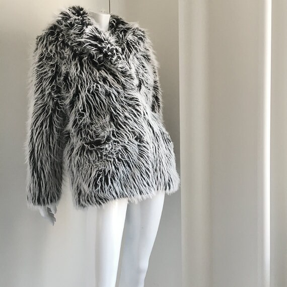 white fluffy jacket