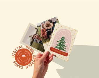 May include: A hand holds three digital download cards. One card features a Christmas tree in a snow globe with "Happy Christmas" text. The other two cards have photographs. A circular logo with the text "Digital Downloadable Cards" is also visible.