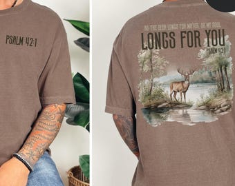 May include: Espresso-colored t-shirt with the text "PSALM 42:1" on the front. The back features a nature scene with a deer and the text "AS THE DEER LONGS FOR WATER, GO MY SOUL LONGS FOR YOU PSALM 42:1".
