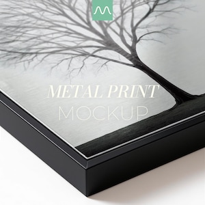 May include: A black and white metal print mockup featuring a leafless tree silhouette against a bright background. The print is encased in a sleek black frame. The text "METAL PRINT MOCKUP" is centered on the surface in a white serif font.