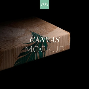 May include: A rectangular canvas mockup featuring a tan background with fine vertical lines and a dark green feather graphic. The text CANVAS MOCKUP is printed in white across the center. A small teal square with a white M logo sits at the top.