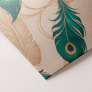 May include: Close-up of a patterned surface featuring peacock feather designs. The feathers are in shades of teal, gold, and tan, with intricate detailing. The background is a neutral beige color, creating a sophisticated and elegant aesthetic.