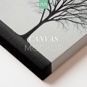 May include: Canvas mockup featuring a black and white tree illustration. The canvas has a textured surface and a black border. The words "CANVAS MOCKUP" are printed on the canvas.