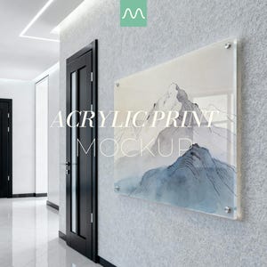 May include: A rectangular acrylic print featuring a watercolor-style mountain landscape in shades of blue and grey, mounted with four silver standoffs. The text ACRYLIC PRINT MOCKUP is overlaid in white, with a small green logo at the top center.