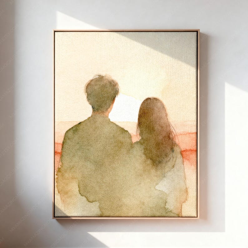 May include: A framed watercolor painting depicting two figures seen from behind, standing side by side. The artwork features soft, muted tones of olive green, beige, and warm orange, capturing a sunset scene with a bright, glowing horizon line.