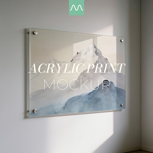 May include: A rectangular acrylic print featuring a watercolour-style mountain landscape in shades of blue, grey, and white. The print is mounted with four silver-toned metal standoffs at the corners. The text ACRYLIC PRINT MOCKUP is centred.