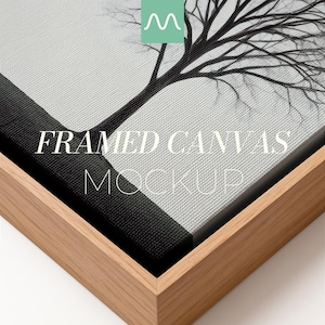 May include: Framed canvas mockup with a black and white tree illustration. The canvas is set in a light brown wooden frame. The text "FRAMED CANVAS MOCKUP" is displayed on the canvas.