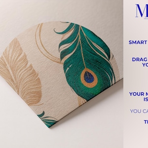 May include: A fan-shaped design featuring peacock feather patterns in teal, gold, and beige. The design includes text that reads "MA Mockup", and instructions: "Open Smart Object", "Drag & Drop Your Art", and "Save It!"