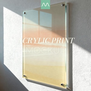 May include: A rectangular acrylic print featuring a soft, abstract gradient of peach, orange, and yellow hues. The print is mounted with four silver-toned metal standoffs at the corners. The text ACRYLIC PRINT MOCKUP is centered on the surface.