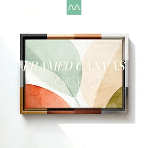 May include: A rectangular framed canvas featuring an abstract watercolor print with overlapping leaf-like shapes in muted sage green, soft peach, and terracotta orange. The frame displays a multi-textured border with wood and metallic finishes.