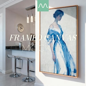 May include: A framed canvas mockup showing a watercolour painting of a woman in a blue dress. The artwork is displayed in a room with a modern bar and stools. The text "FRAMED CANVAS MOCKUP" is overlaid on the image.