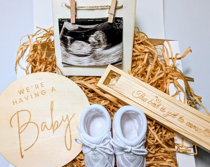 Pregnancy announcement box; All the props you need to create your announcement your way.